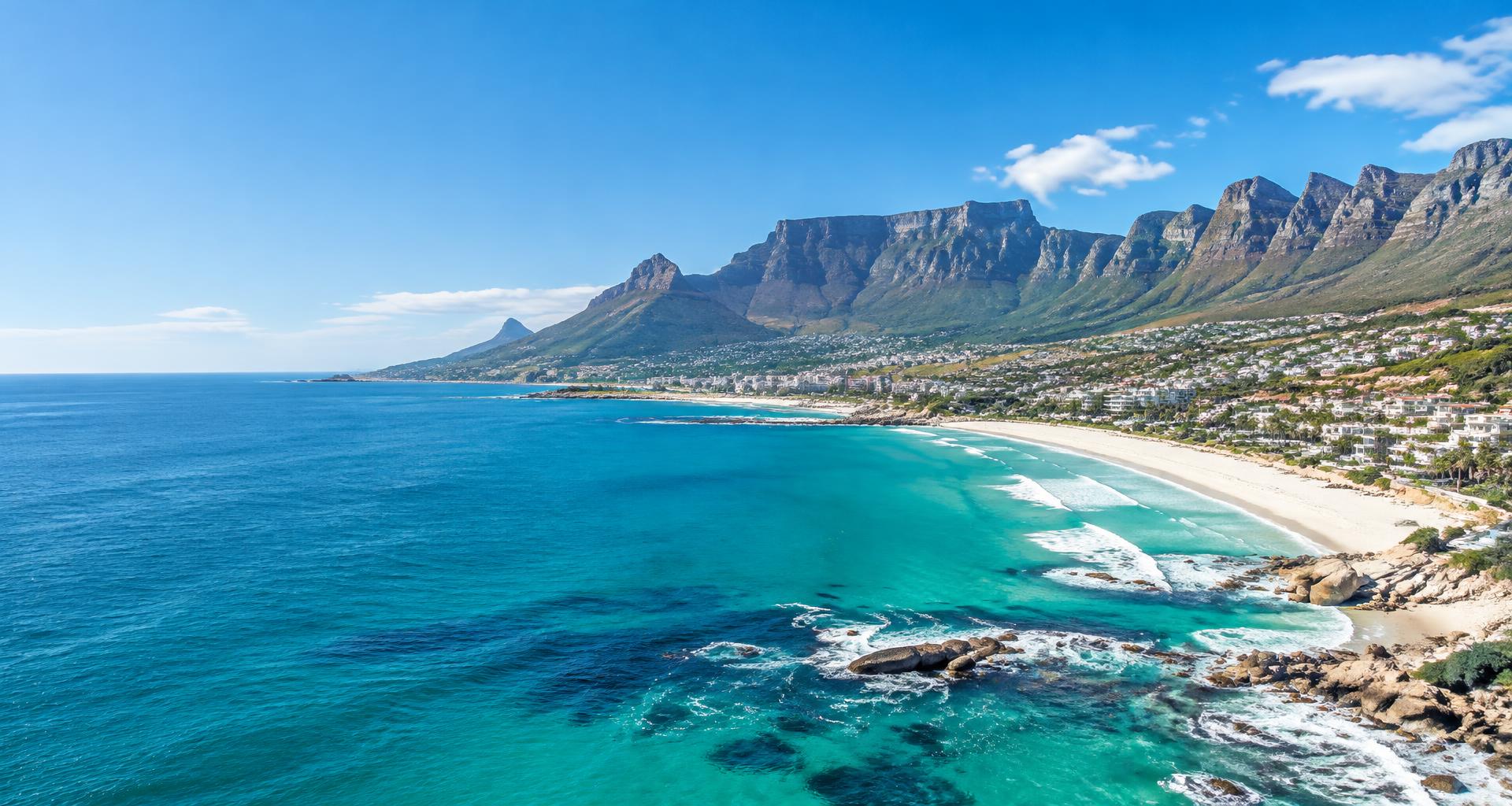 Turquoise Atlantic coastline below Table Mountain in Cape Town